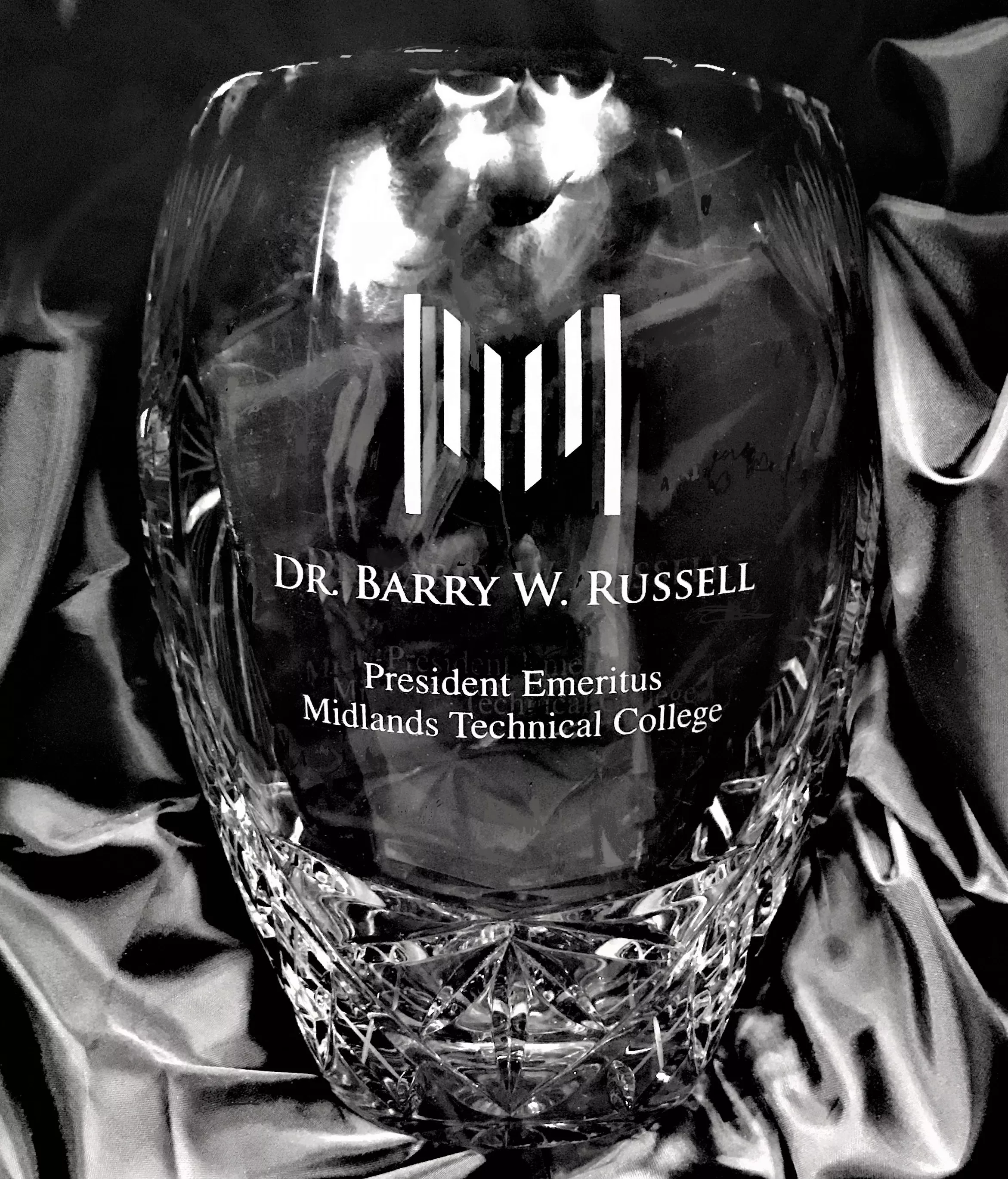 A vase honors Dr. Barry W. Russell as President Emeritus