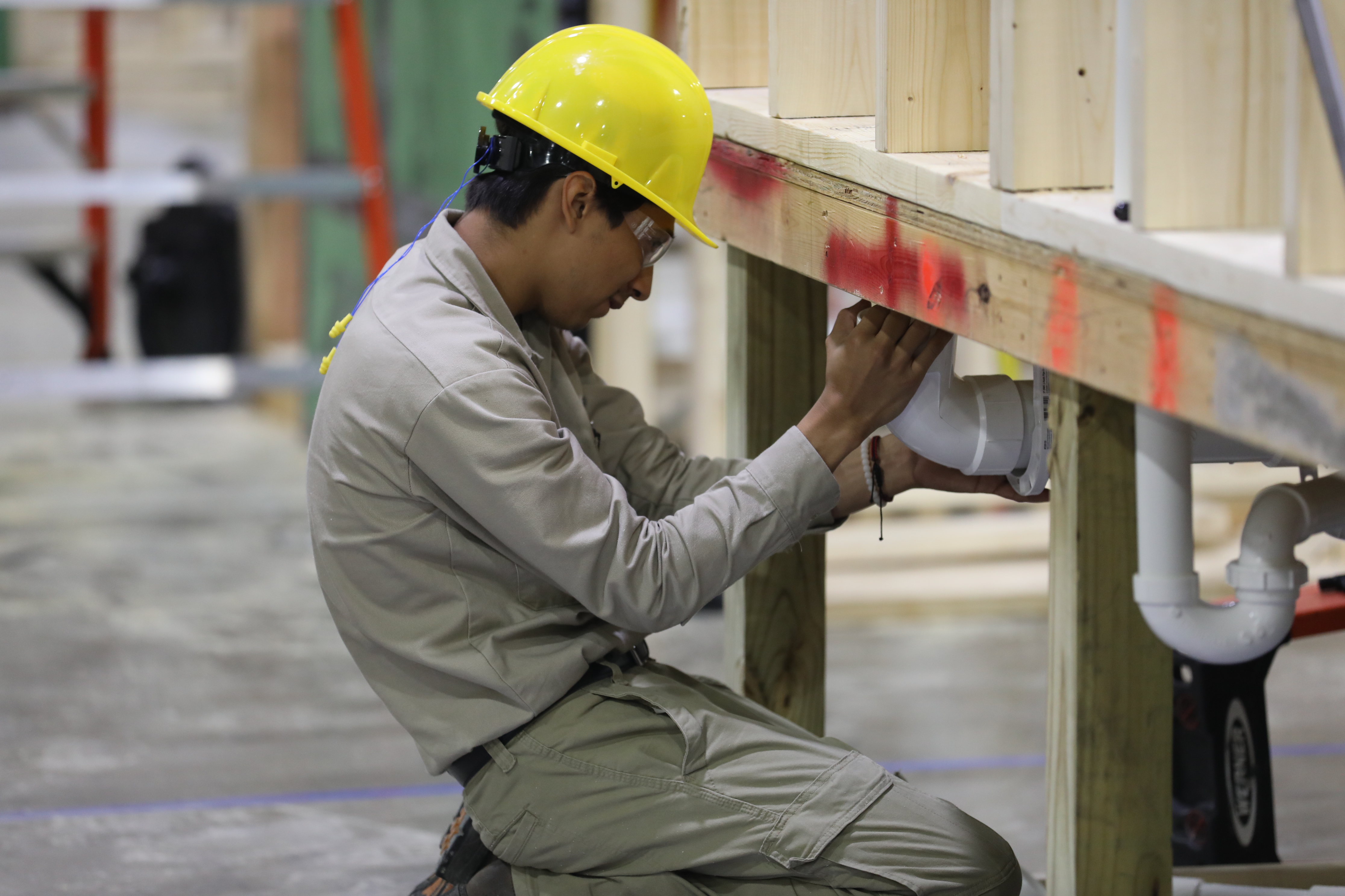 Image of MTC Building Construction team competing in the 2023 SkillsUSA championship.