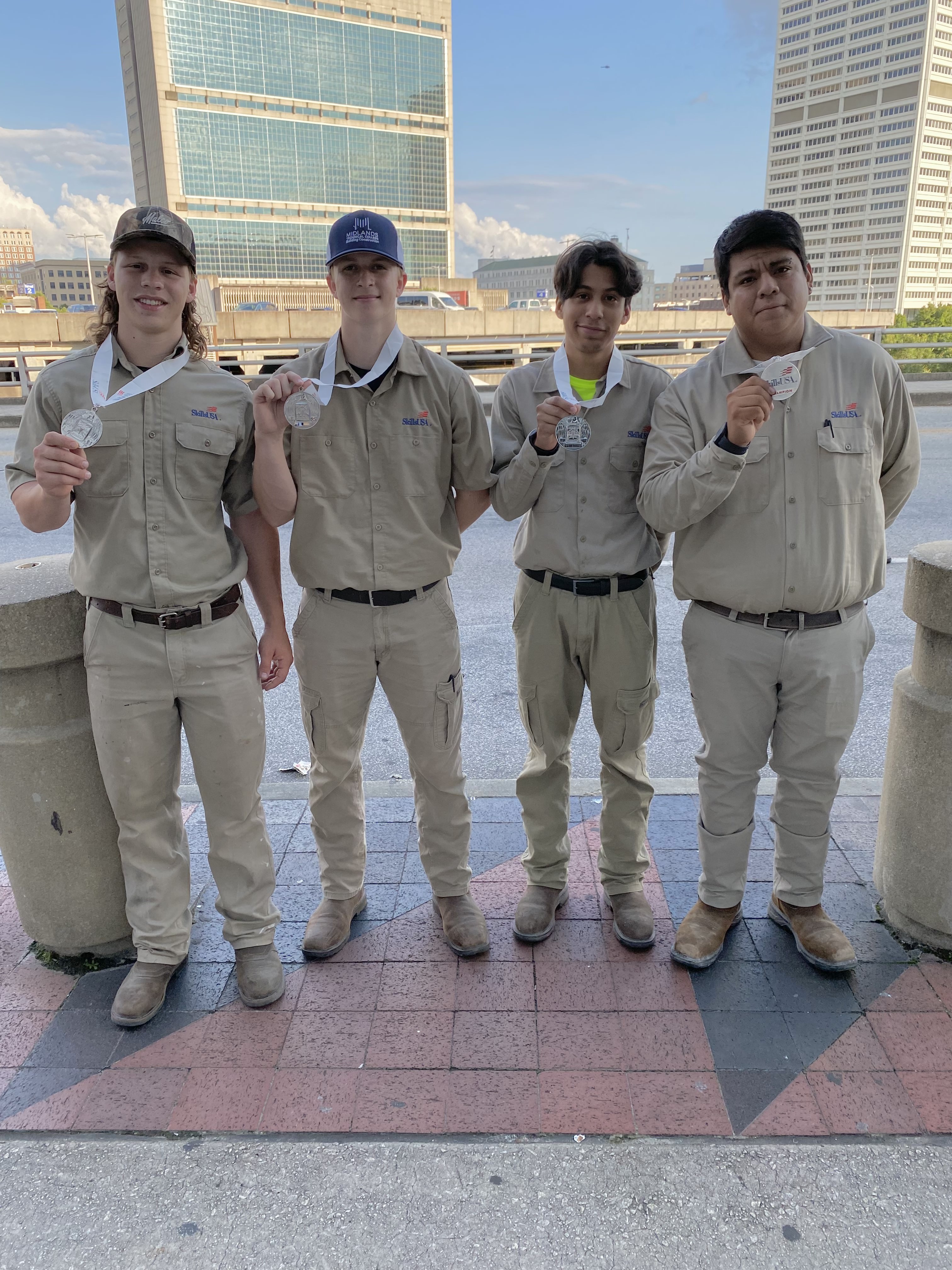 Image of MTC Building Construction team competing in the 2023 SkillsUSA championship.