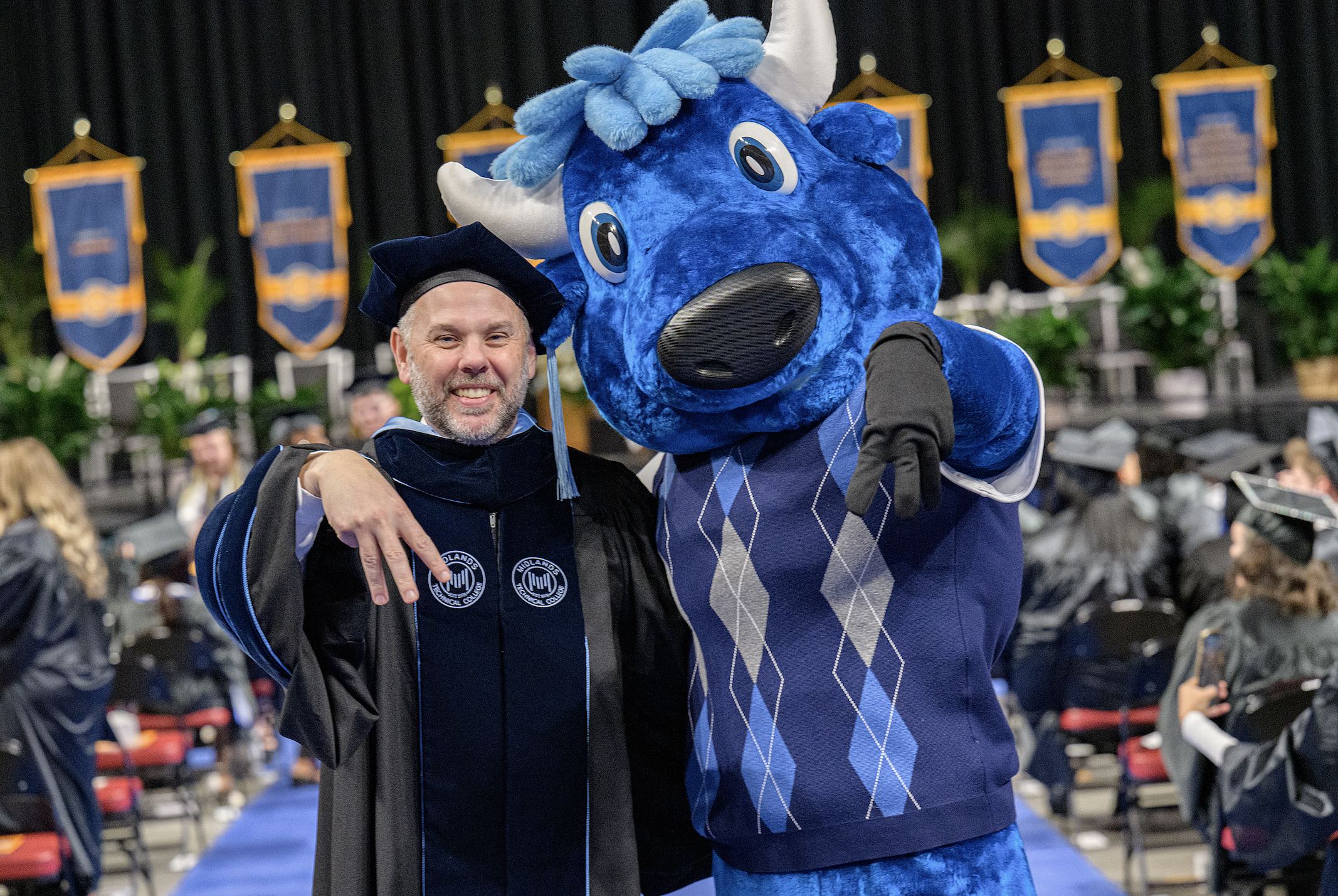 MTC President Greg Little with Mav the Mascot