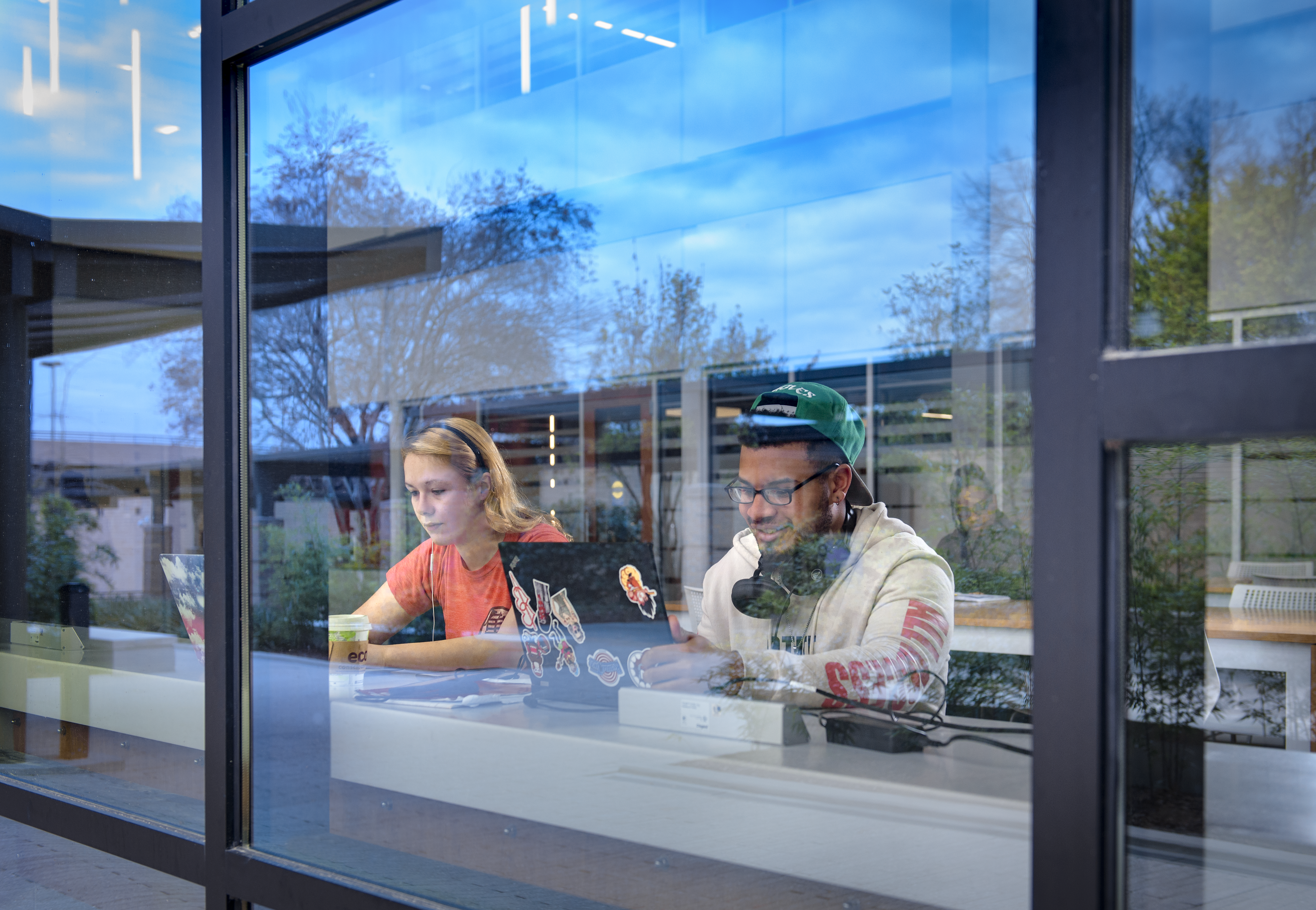 Two students studying in the academic success center