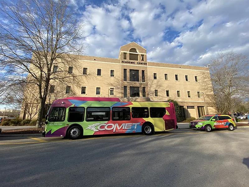 Comet Bus in Front of Academic Center