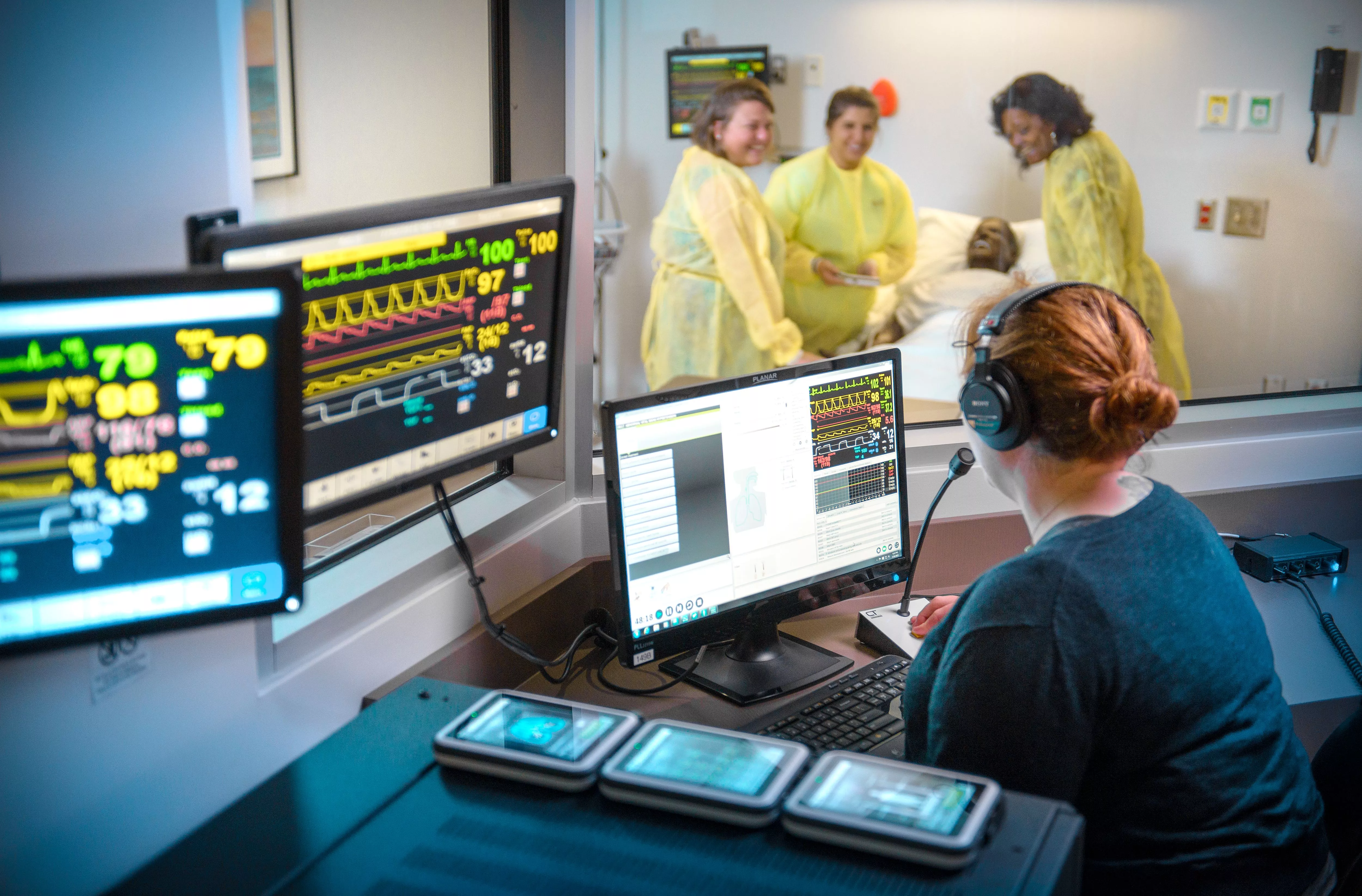 Nurses examining patient