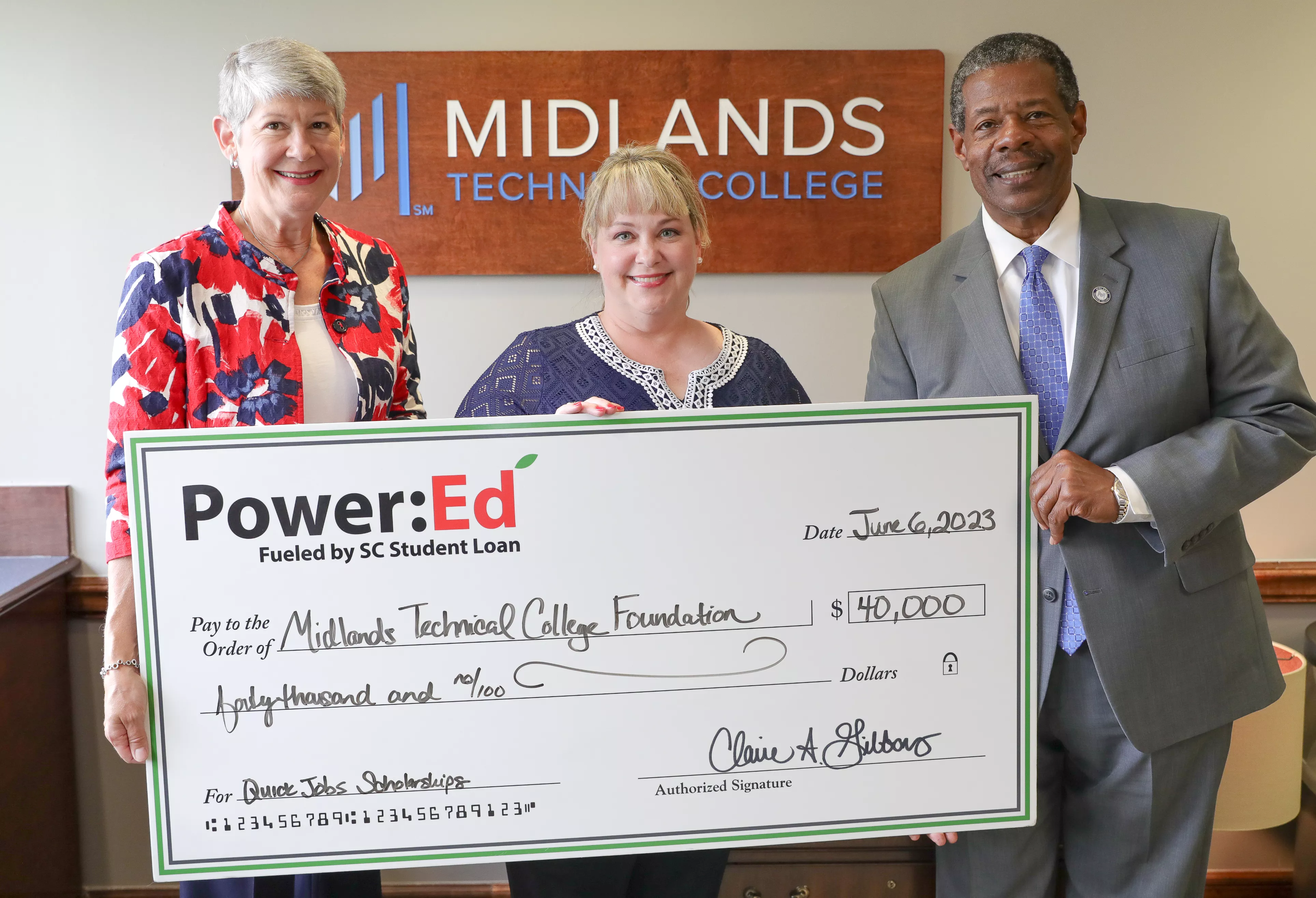 Pictured left to right: MTC Foundation CEO Nancy McKinney, Power:Ed Executive Director Claire Gibbons, MTC President Dr. Ronald L. Rhames