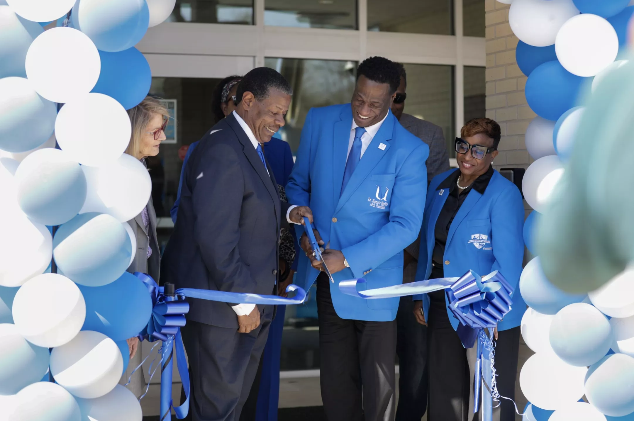 Presidents from MTC and Voorhees cut the ribbon to open the new center.