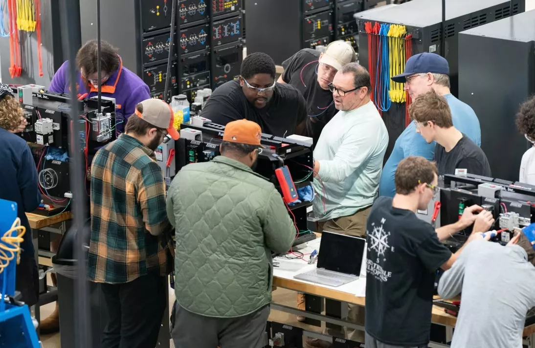 Image of MTC mechatronics students working in a classroom.