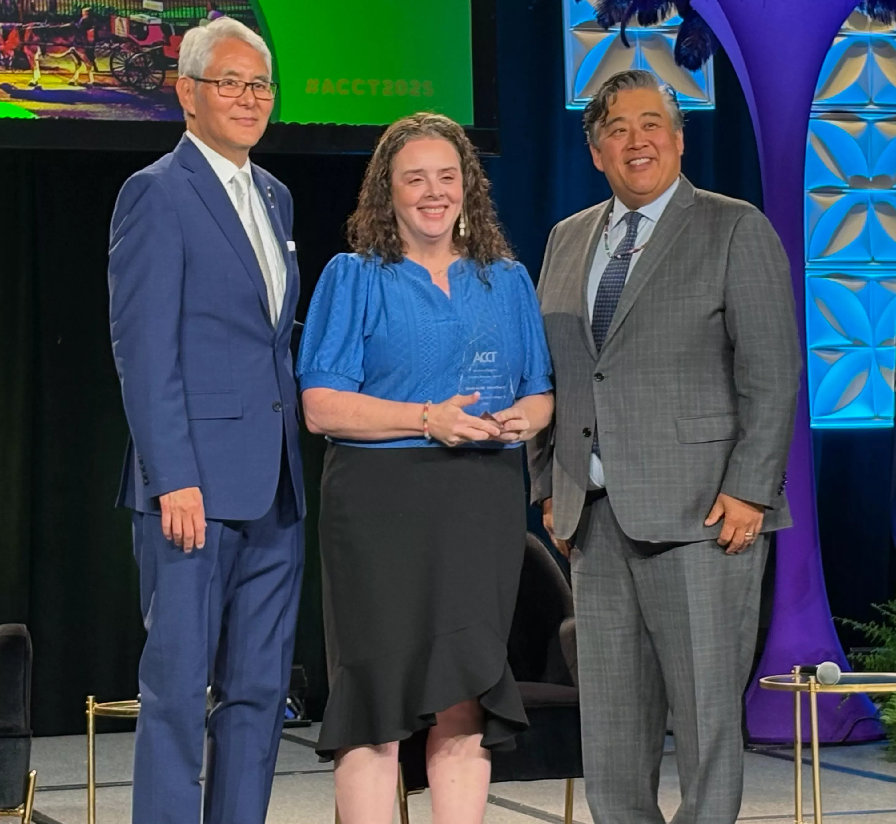 Lindsay Weathers accepting award from ACCT