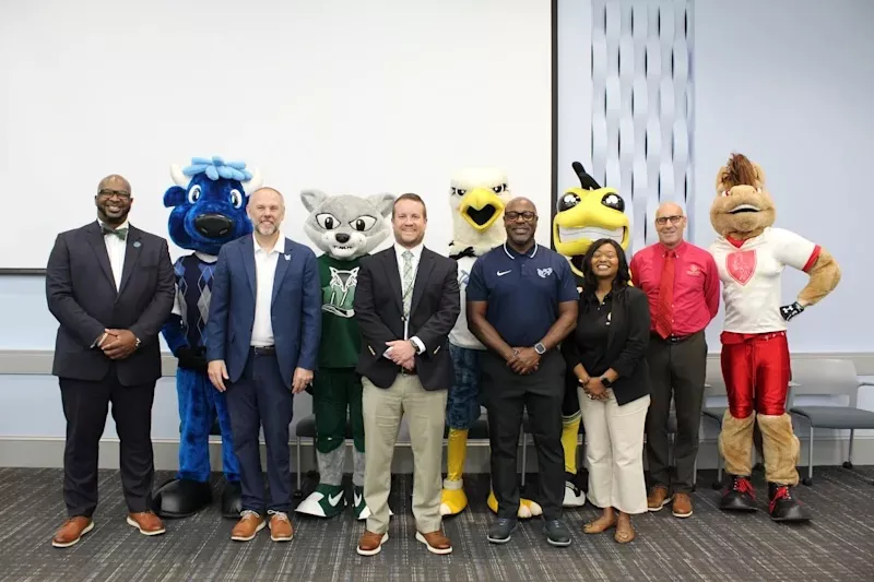 Dr. Little with Lexington/Richland School District 5 representatives and school mascots