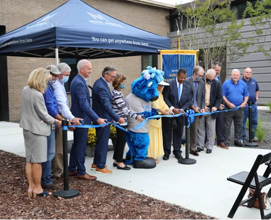 Leaders, dignitaries, and Mav the mascot cut the ribbon on MTC’s Welding Technology Center on September 22, 2021.